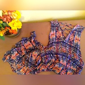 Fitted and flown maxi dress. Hip tie and additional stylish straps on back.